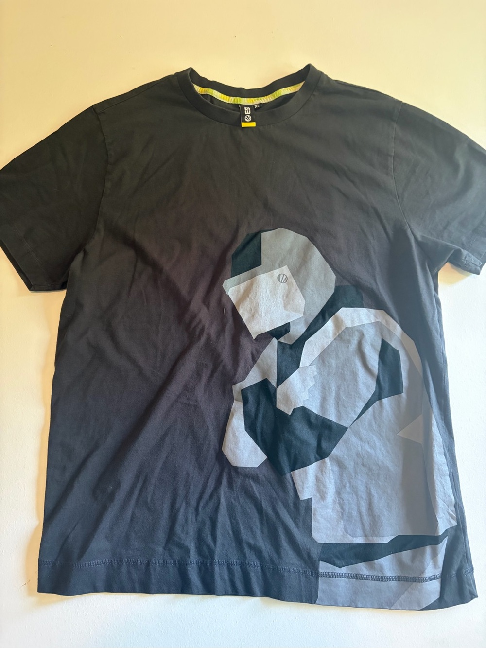Men's Black Graphic Tee with Geometric Athlete Print